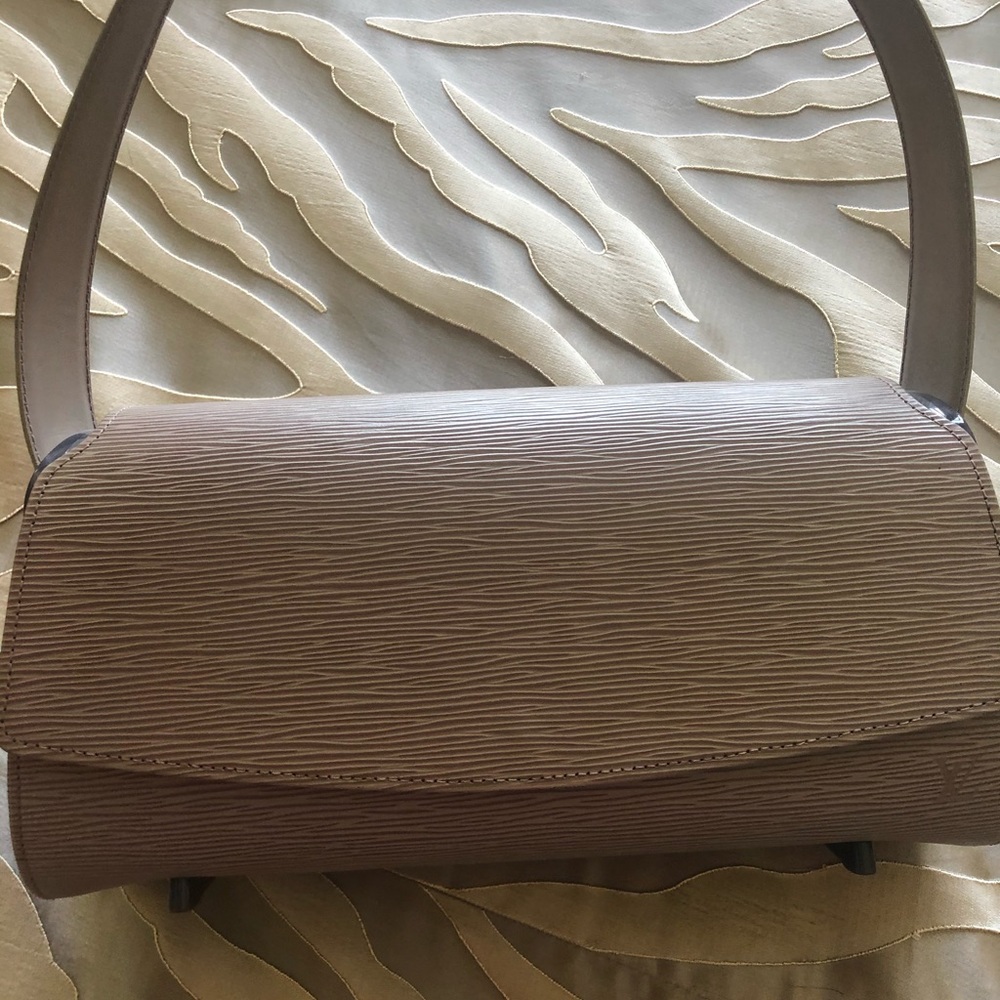 Louis Vuitton epi leather Nocturne GM handbag.